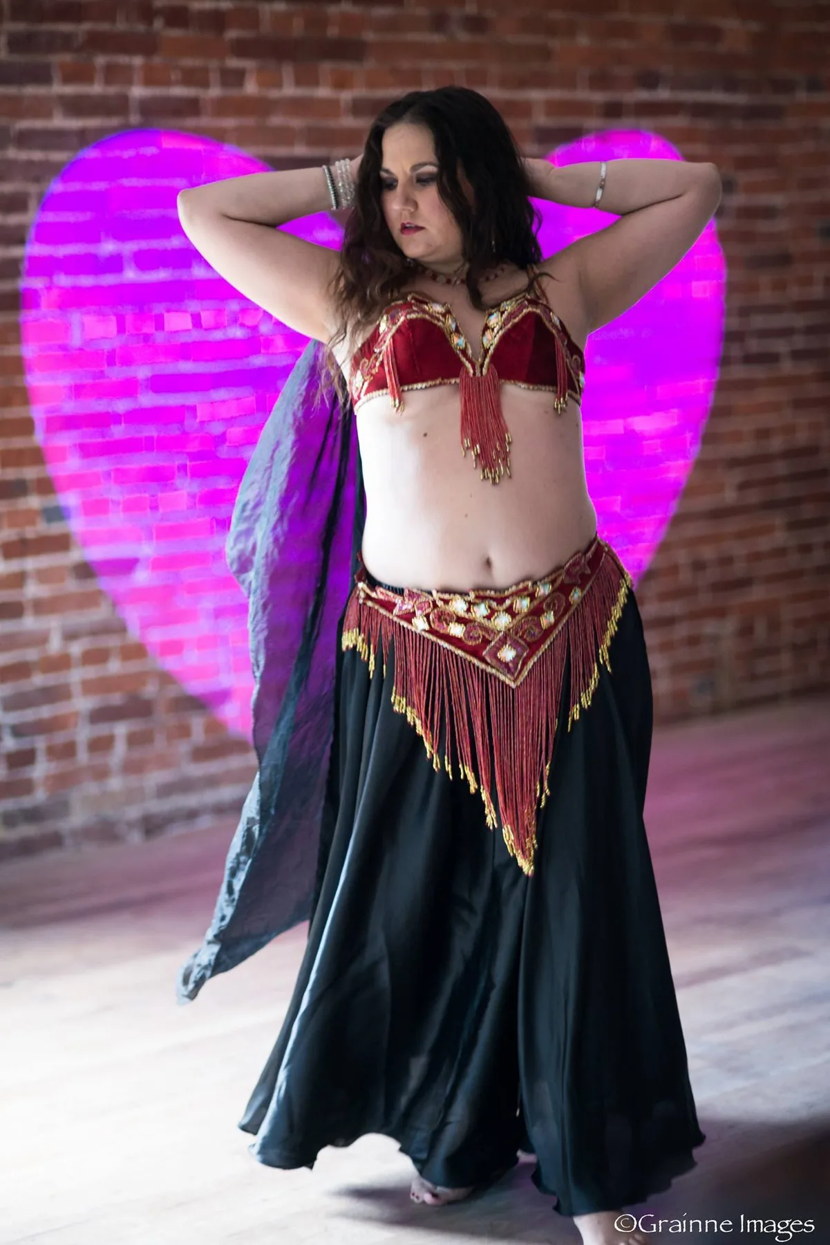 Lorenda performing a tailored belly dance routine