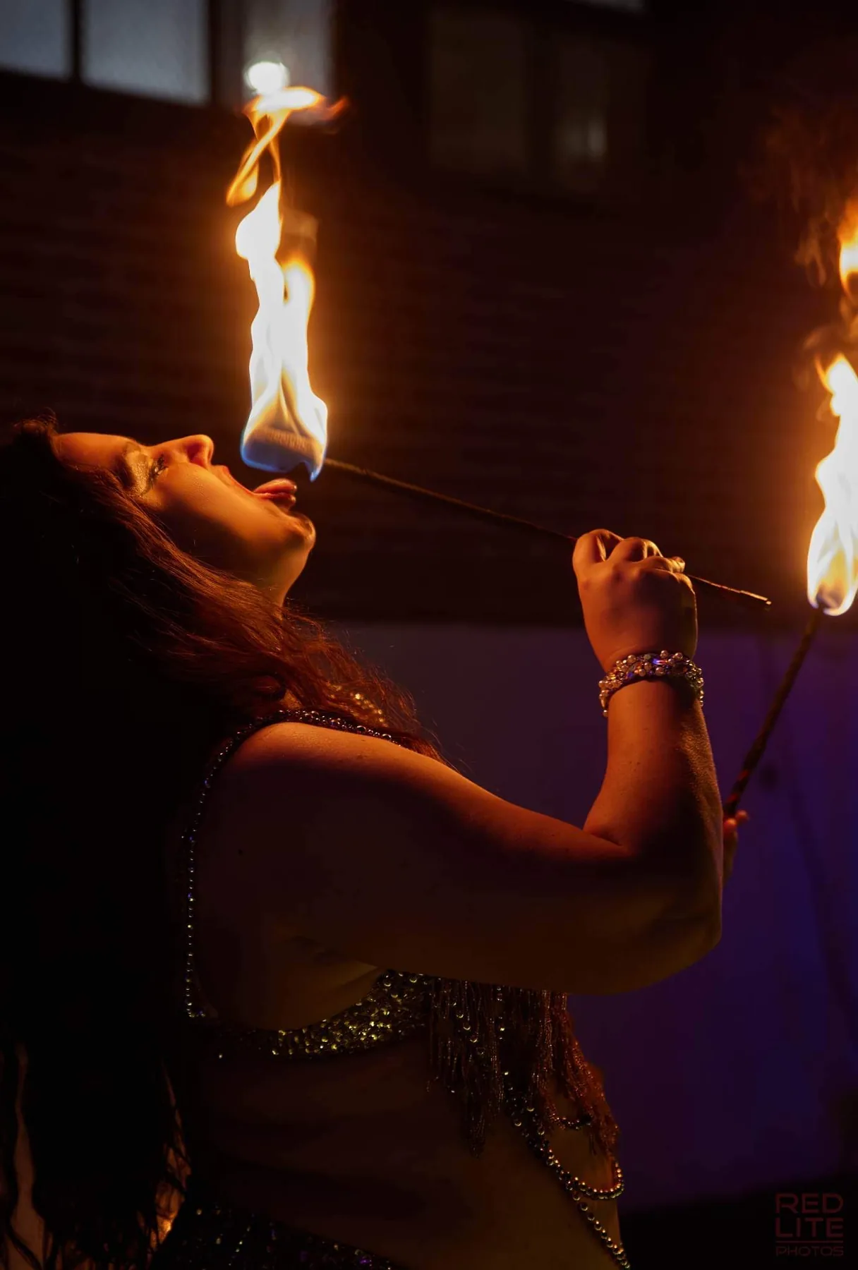 Lorenda performing fire eating