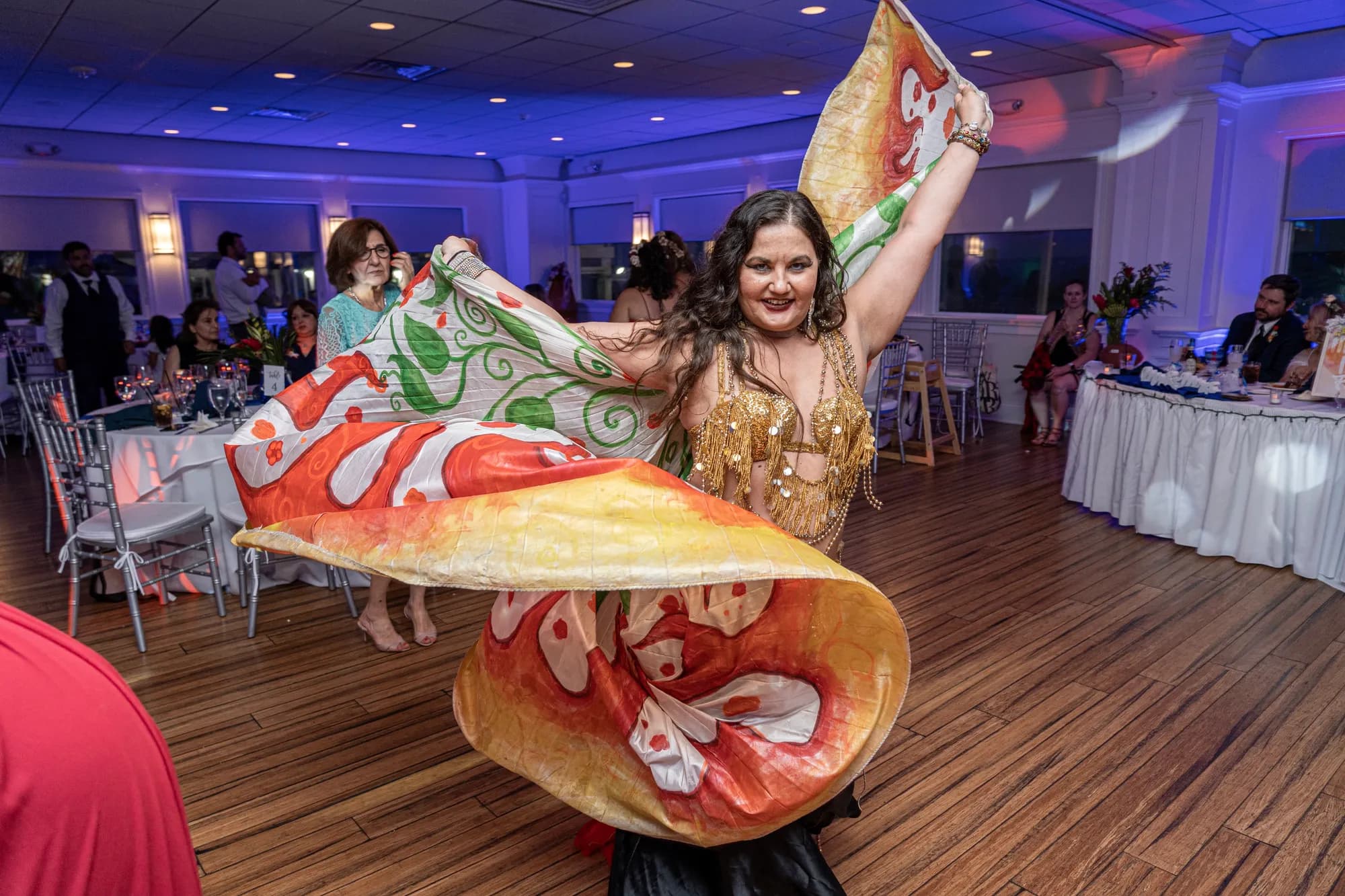 Lorenda belly dancing at a wedding celebration