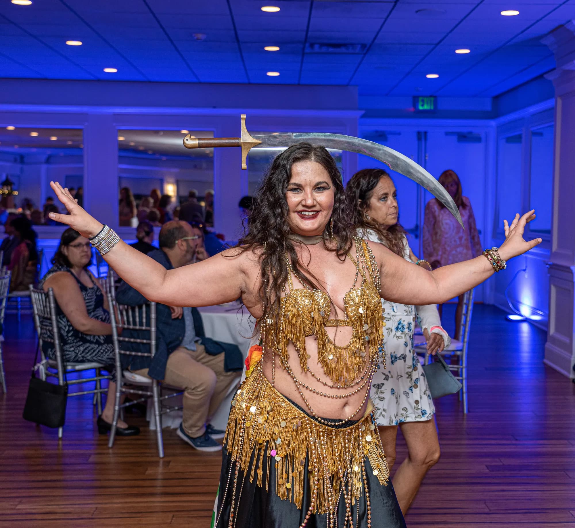 Lorenda belly dancing at a wedding celebration