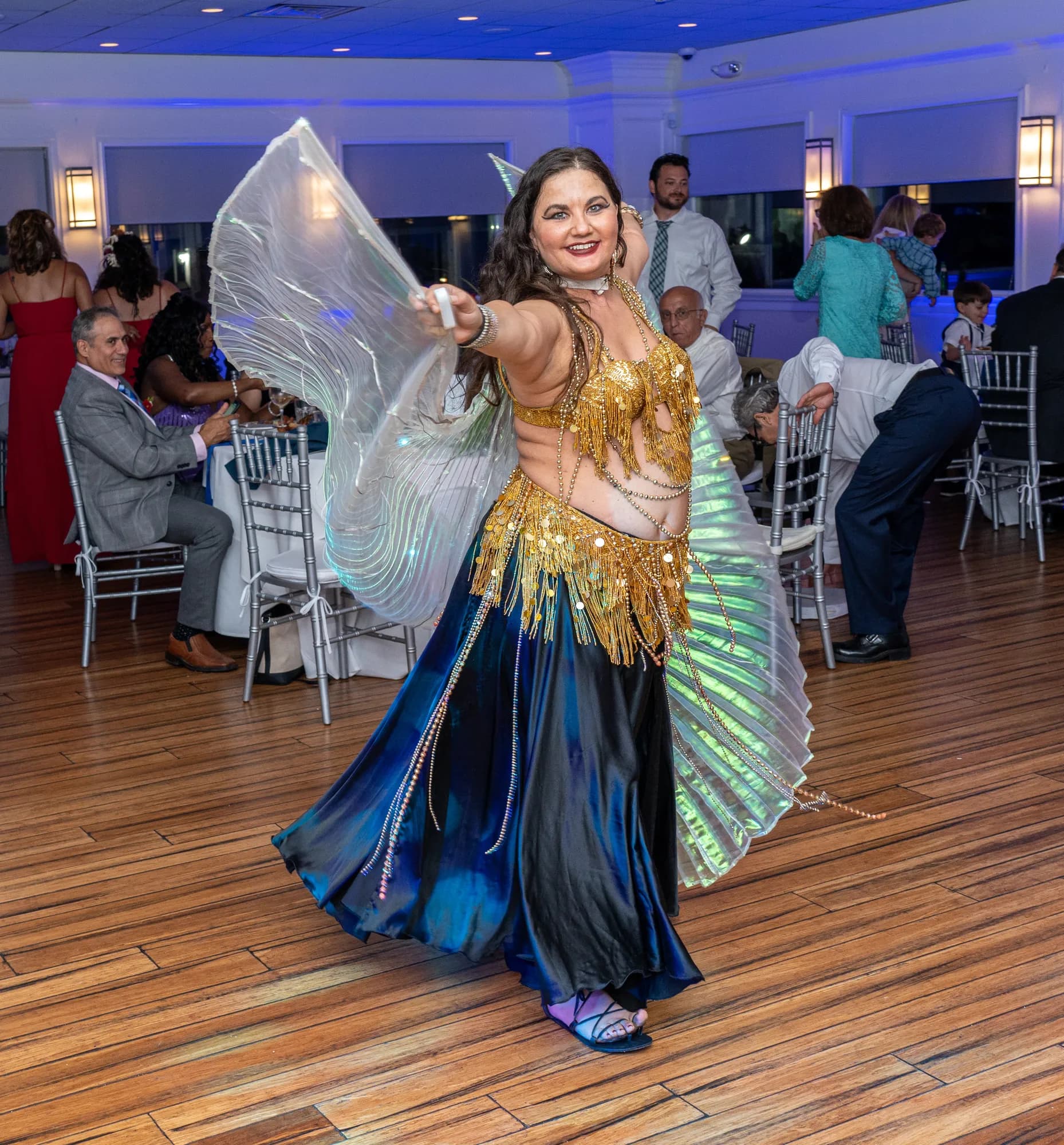 Lorenda belly dancing at a wedding celebration