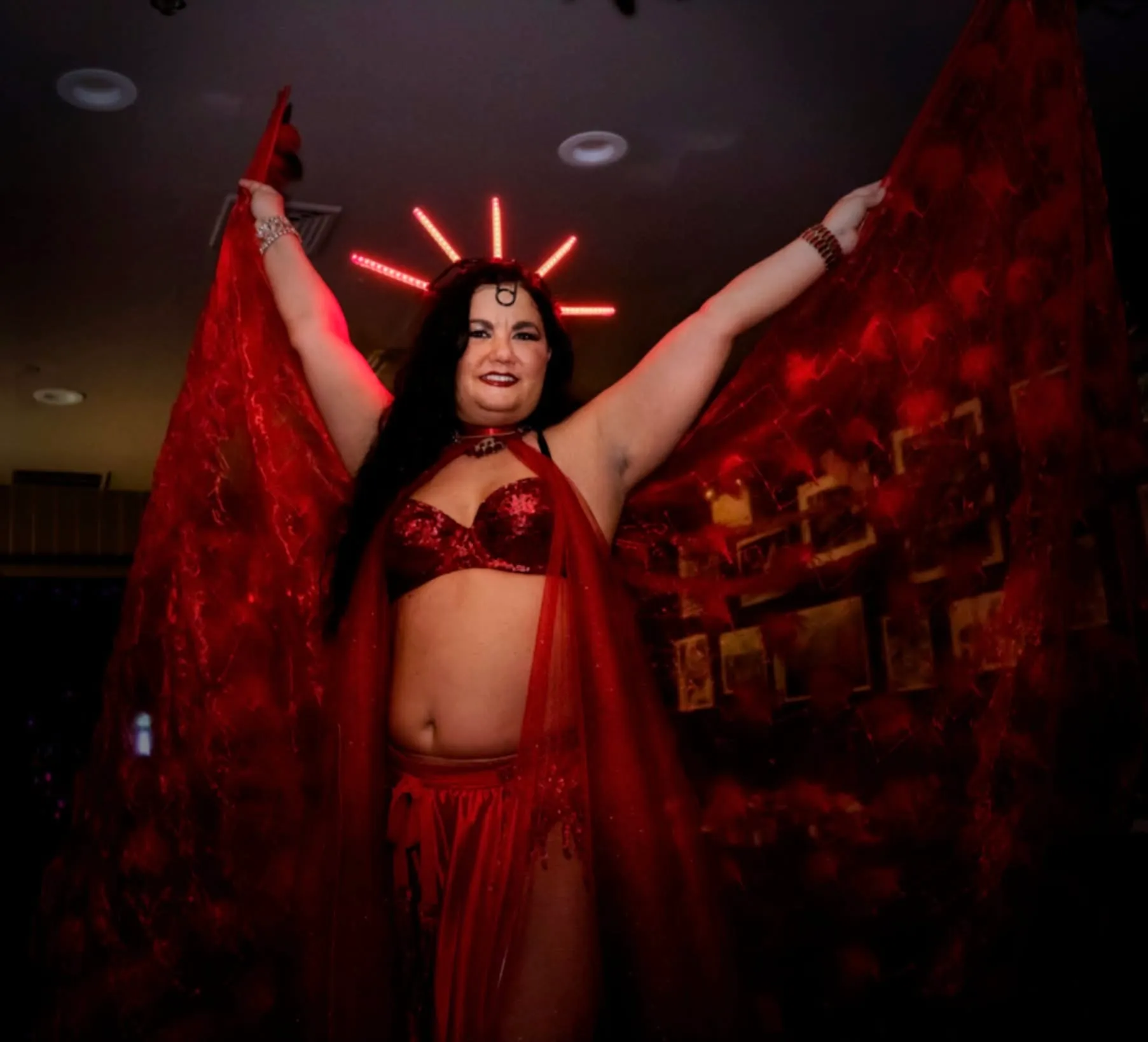 Lorenda belly dancing at a wedding celebration
