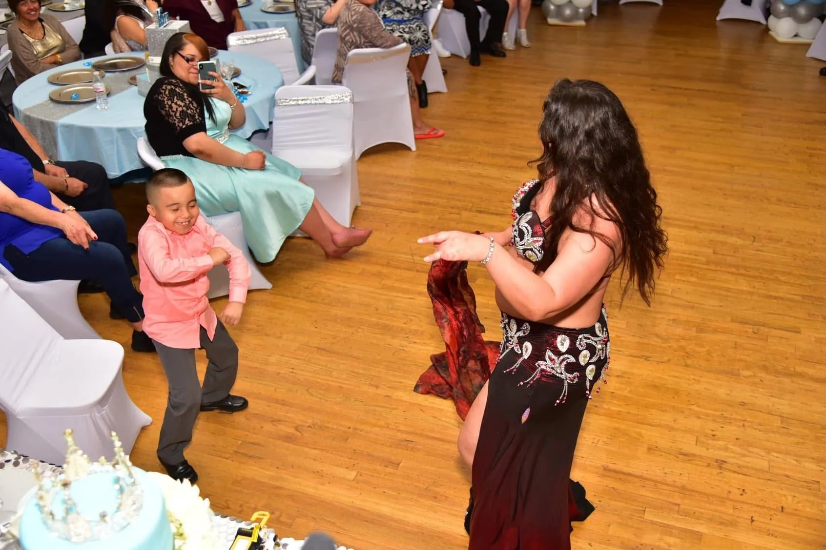 Lorenda belly dancing at a wedding celebration