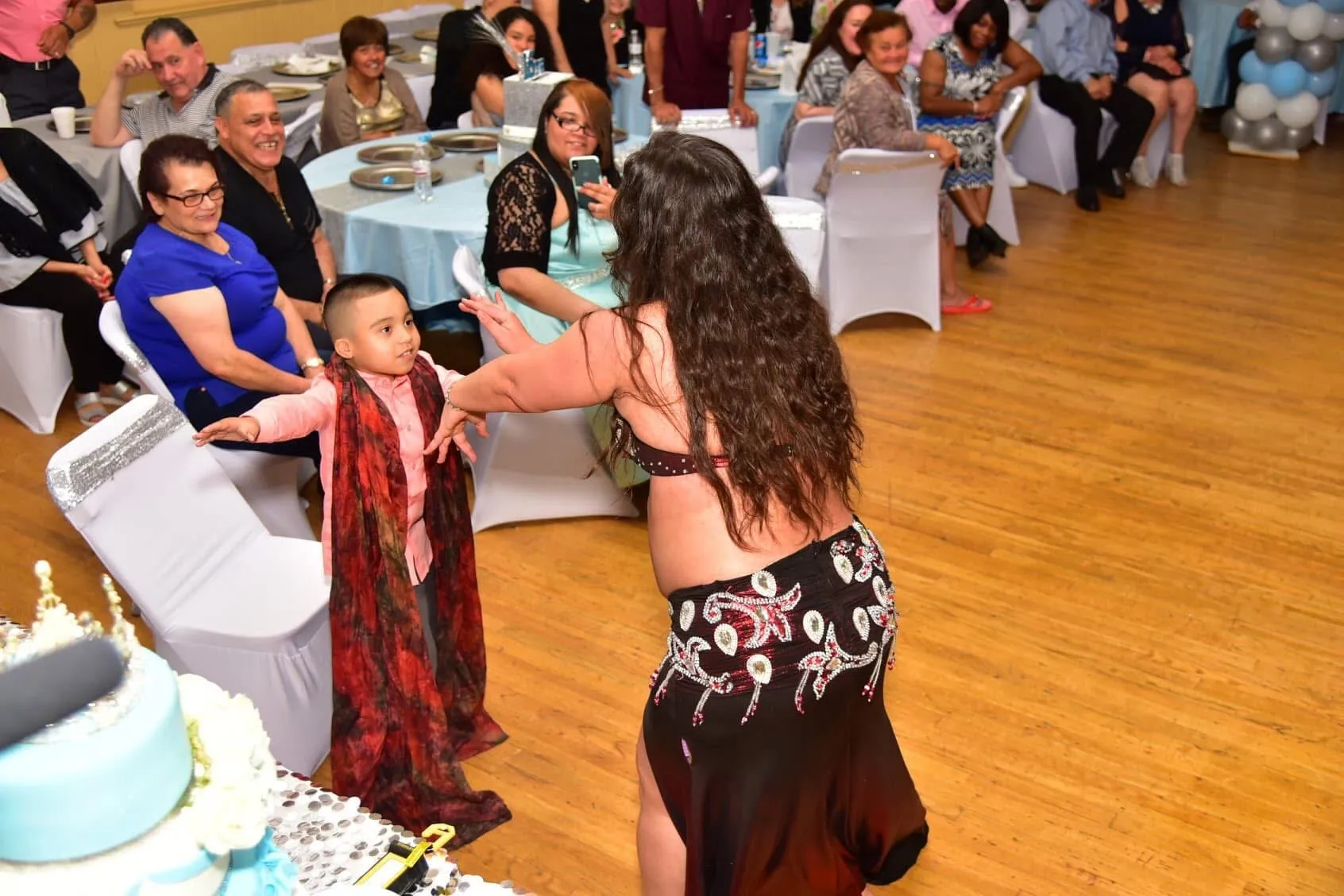 Lorenda belly dancing at a wedding celebration