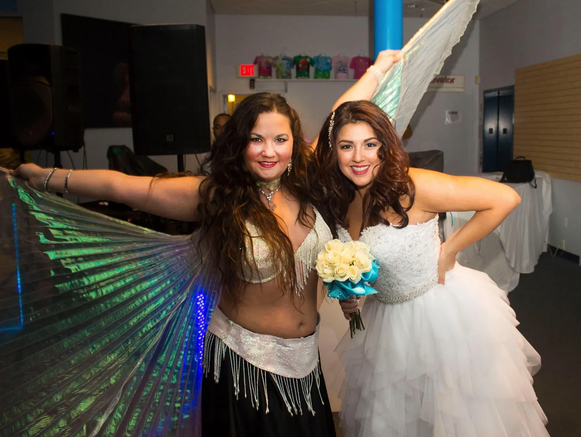 Lorenda belly dancing with a bride at a wedding celebration