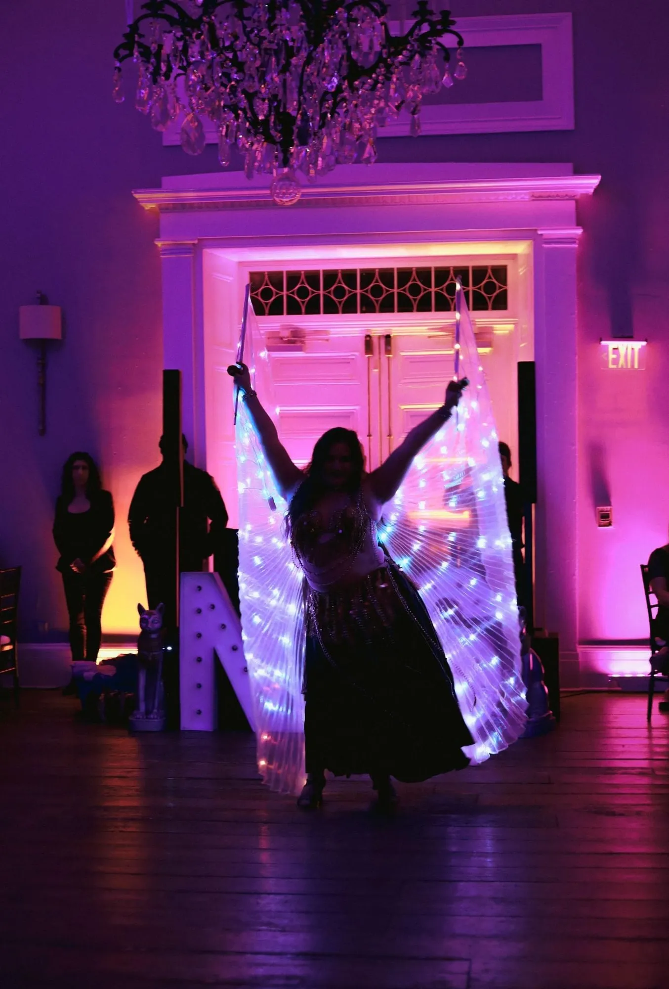 Lorenda belly dancing at a wedding celebration