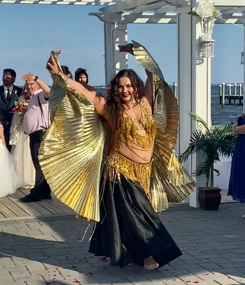 Lorenda belly dancing at a wedding celebration