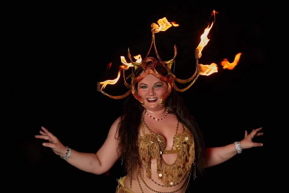 Lorenda performing with fire at a wedding celebration