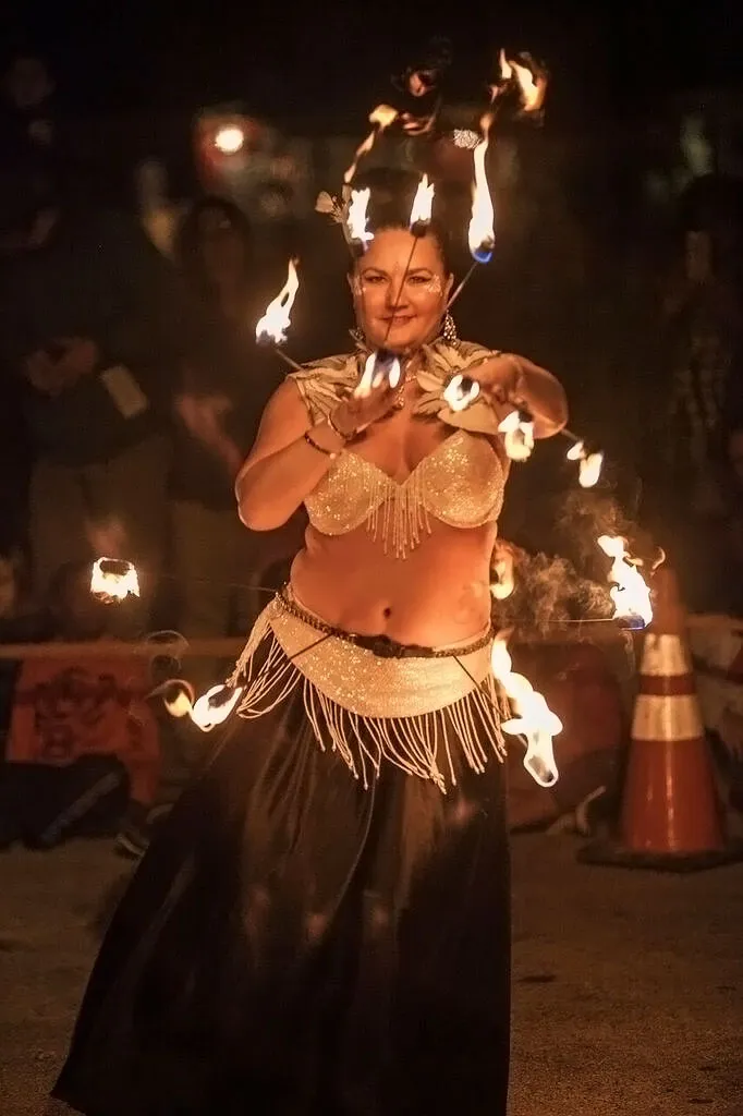 Lorenda performing with fire at a wedding celebration