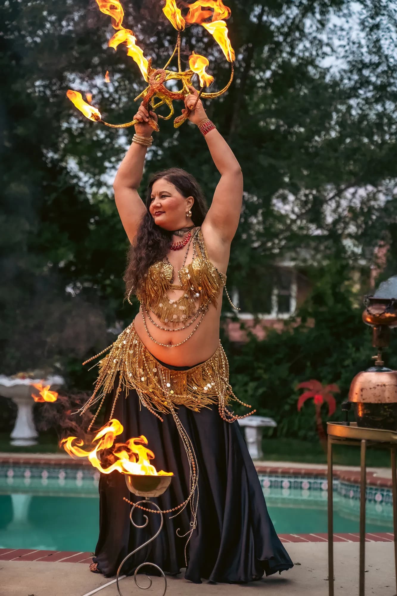 Lorenda performing with fire at a wedding celebration